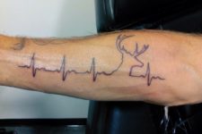 Heartbeat and deer tattoo