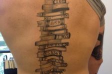 Large book tattoo on the back