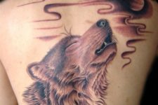 Large wolf tattoo on the back