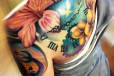Lily flower and clock tattoo on the back and shoulder