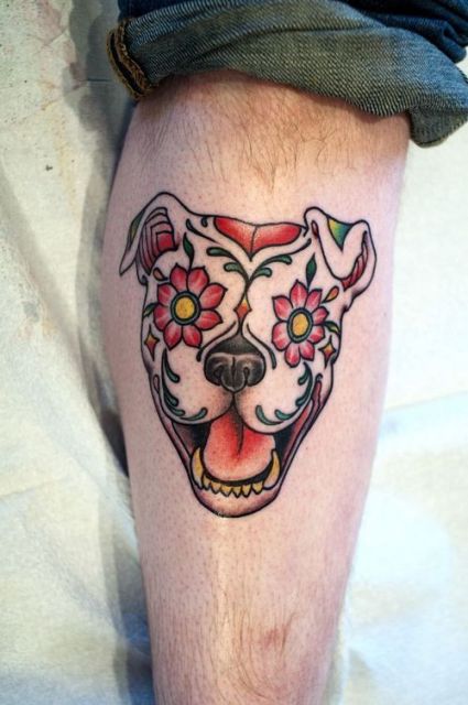 Mexican skull tattoo on the leg