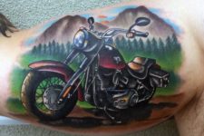 Motorcycle and mountains tattoo