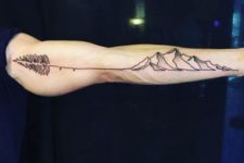 Mountain with feather tattoo on the arm