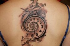 Music clock tattoo on the back