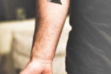 Original mountain tattoo on the arm