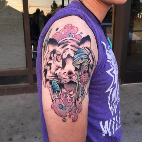 Pink and blue colored tiger tattoo