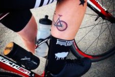 Red and black bicycle tattoo