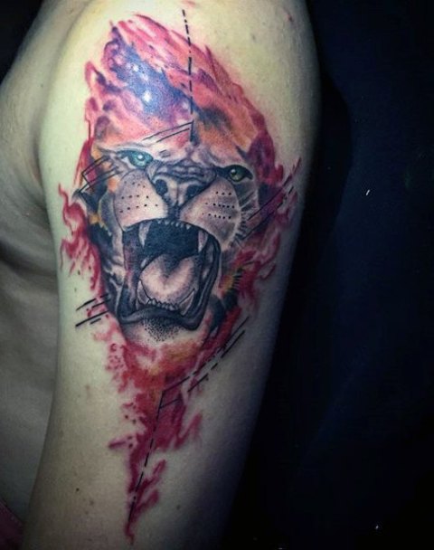Roaring lion tattoo on the arm