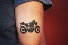 Small motorcycle tattoo on the hand