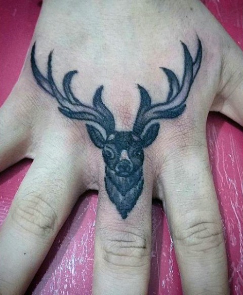 Small tattoo on the hand and finger
