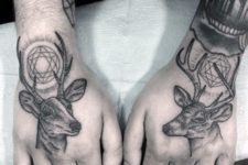 Two deer tattoos on the both hands