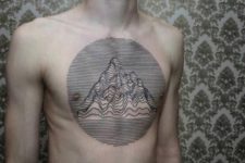 Unique mountain tattoo on the chest