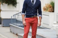 With printed shirt, striped tie, navy blue blazer and red pants