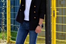 With white t-shirt, skinny jeans and black blazer