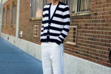 With white t-shirt, striped blazer and white pants