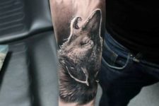 Wolf tattoo on the forearm