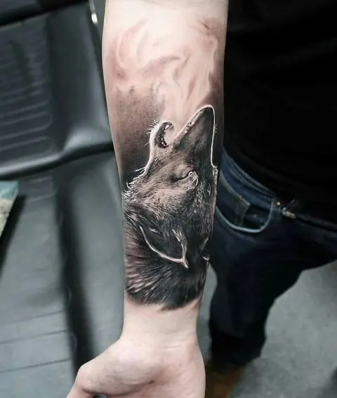 Wolf tattoo on the forearm
