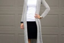 04 a black knee skirt, a white top, a long grey cardigan and black suede peep toe boots