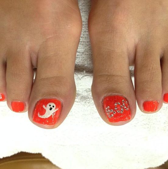 orange toe nails with ghosts and BOO letters of rhinestones