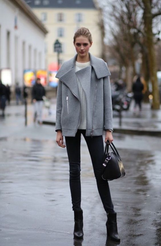 black jeans, a white sweater, a short grey coat and black boots