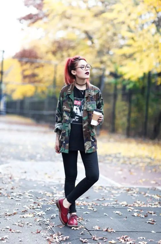 black skinnies, a printed tee, an army-style jacket and red shoes