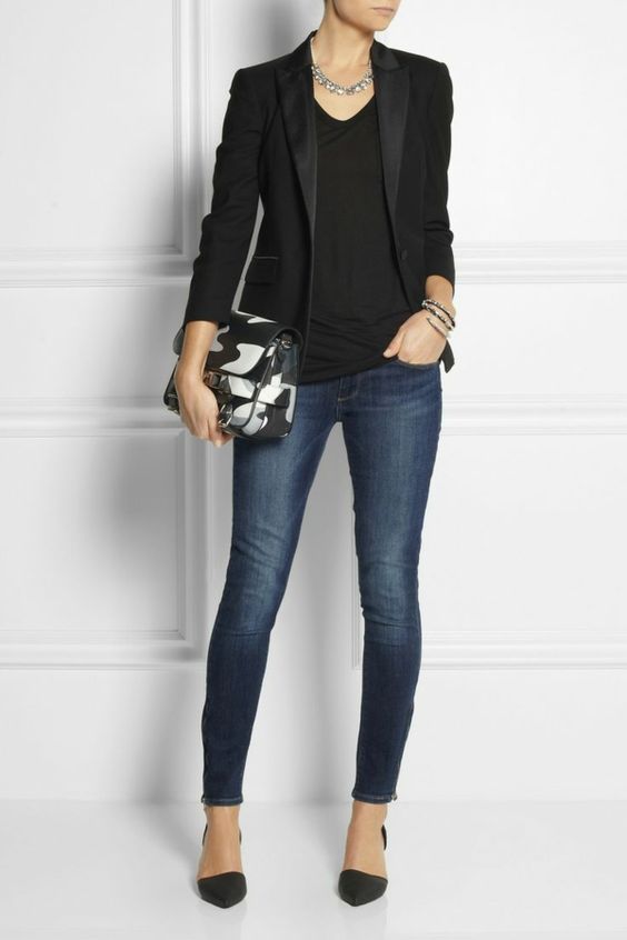 a chic look with navy skinnies, a black top, a black blazer and heels