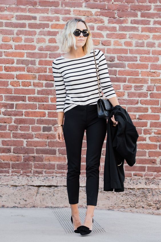 black cropped pants, a black and white striped top, black bow heels for a casual business look