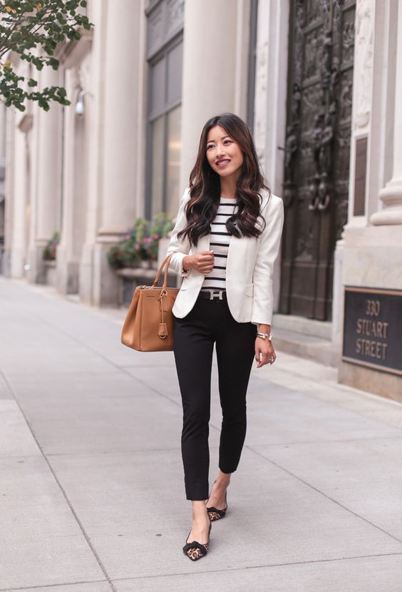 black cropped pants, a striped black and white top, a white blazer, leopard flats and a camel bag are perfect 60 degrees weather outfit