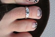 10 elegant French pedicure with black and white polka dots and a spider with a rhinestone