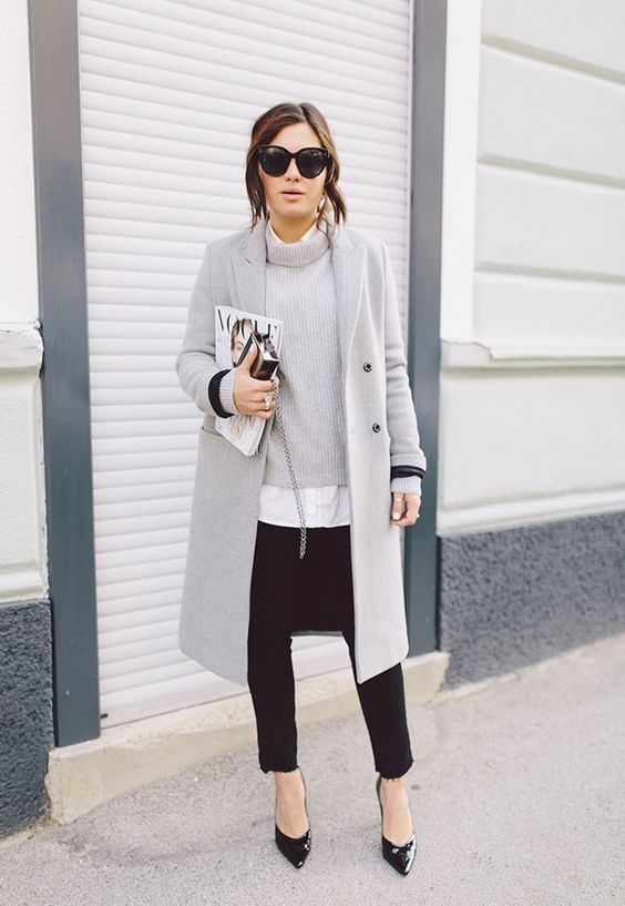 black skinnies, a grey sweater, a white shirt, a grey coat and black heels