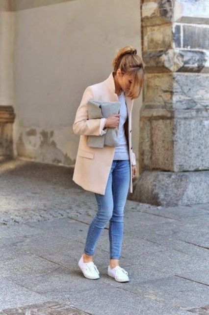 cropped jeans, a grey top, a peachy short coat, white sneakers