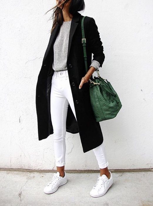 white cropped jeans, white chucks, a silver grey sweater, a black midi coat and a green bag