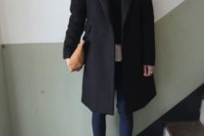 15 navy jeans, black lacquered flats, a black sweater, a white shirt and a black coat