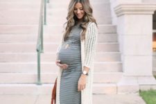 16 a striped grey dress, a white crochet long cardigan and brown booties