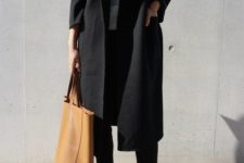 16 a work look with cropped black pants, a white top, black heels and a black coat