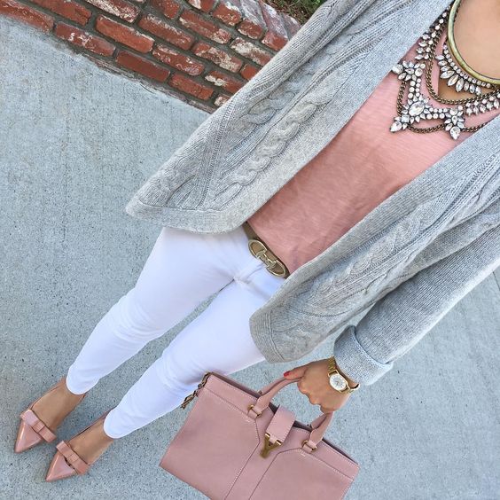 white jeans, a dusty pink top, matching shoes and a bag, a grey cable knit cardigan