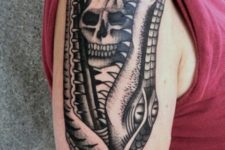 Alligator and skull tattoo