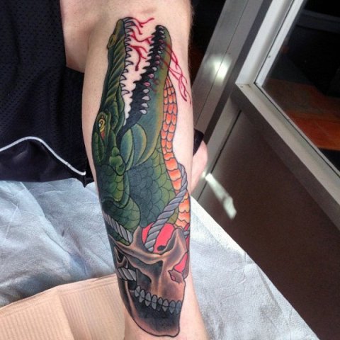 Alligator tattoo on the arm