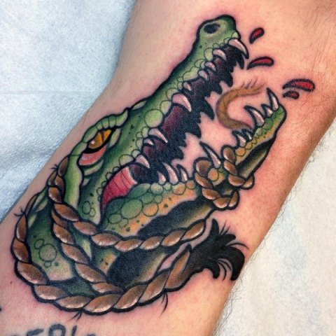 Alligator with rope tattoo