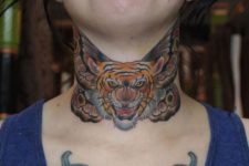 Angry tiger tattoo on the neck