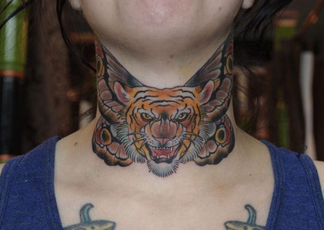 Angry tiger tattoo on the neck