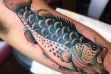 Awesome fish tattoo on the arm