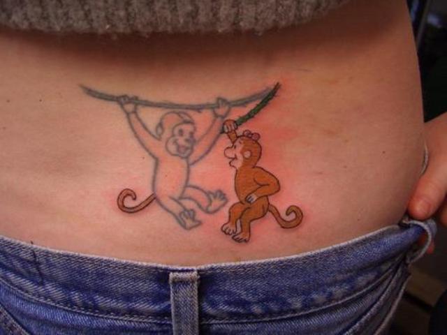 Awesome two monkeys tattoo on the back
