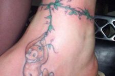 Baby monkey tattoo on the ankle