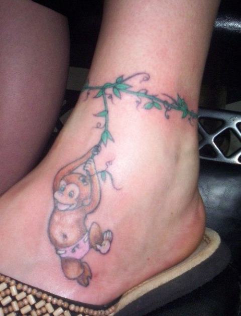 Baby monkey tattoo on the ankle