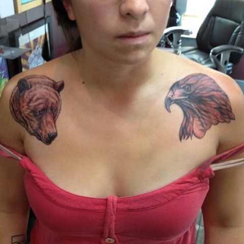 Bear head tattoo on the shoulder