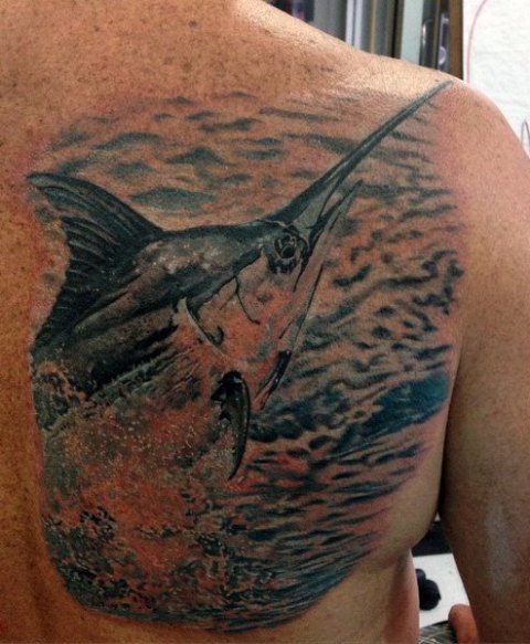 Big fish tattoo on the back