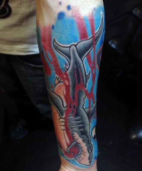Bloodthirsty shark tattoo on the hand