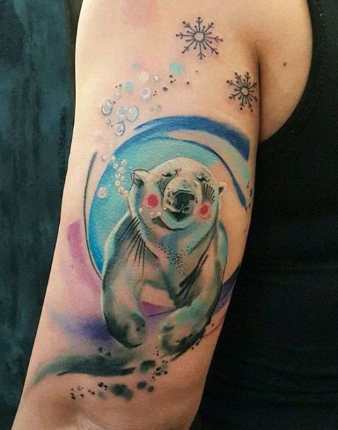 Cartoon polar bear tattoo on the arm