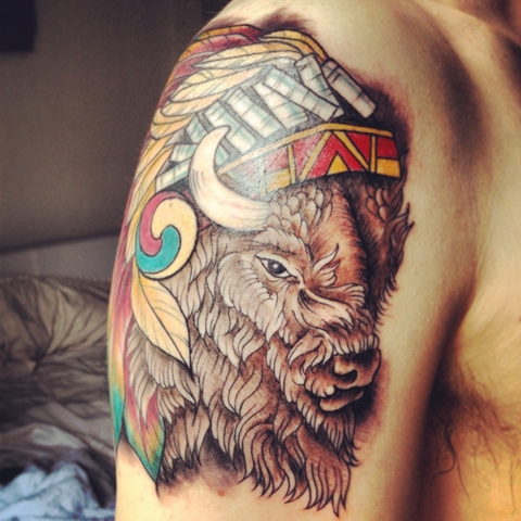Colorful half sleeve bison tattoo